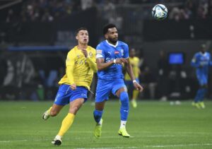 Riyadh (Saudi Arabia), 08/02/2024.- Ali Albulayhi (R) of Al Hilal in action against Cristiano Ronaldo (L) of AL-Nassr during the Riyadh Season Cup 2024 final soccer match between Al Hilal and Al Nassr in Riyadh, Saudi Arabia, 08 February 2024. (Arabia Saudita) EFE/EPA/STR